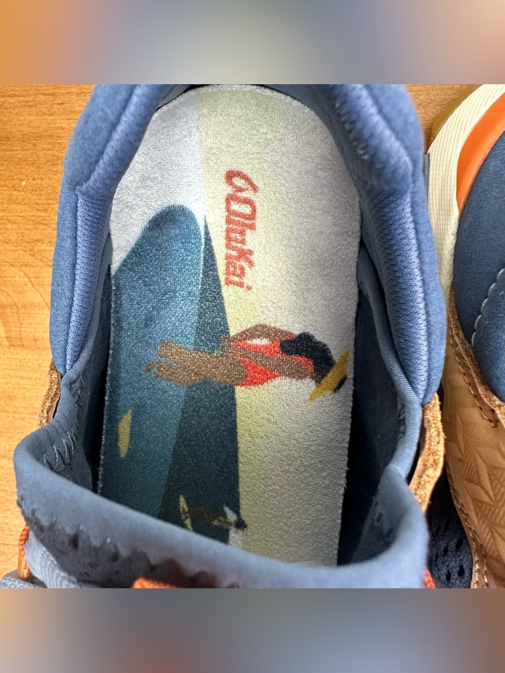 OluKai Women's Navy Blue and Tan Athletic Sneakers with Orange Accents - Picture 10 of 14